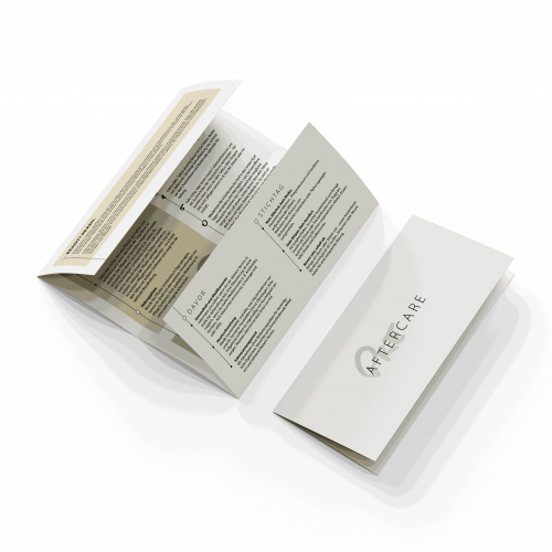 Mockup des PIKASS Aftercare Guides: aufgeklappter Pflege-Guide mit Cover „Aftercare“.