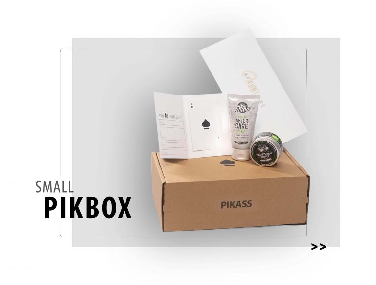 Teaserbild der PIK BOX Small von PIKASS mit Gutschein, Aftercare-Creme, Tattoo Butter und Geschenkbox für Tattoo-Liebhaber